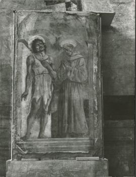 Damaged fresco of two saints