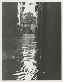 View of a flooded street leading to the Ponte Vecchio