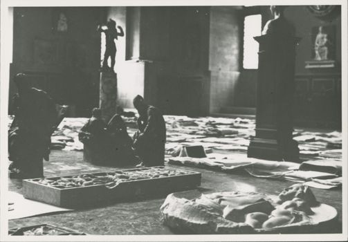 Flood damaged objects laid out on the floor of the Bargello