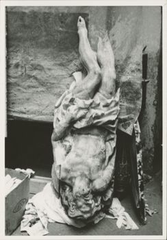 Damaged sculpture of Christ upside down