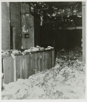 View of damaged books inside the Biblioteca Nazionale